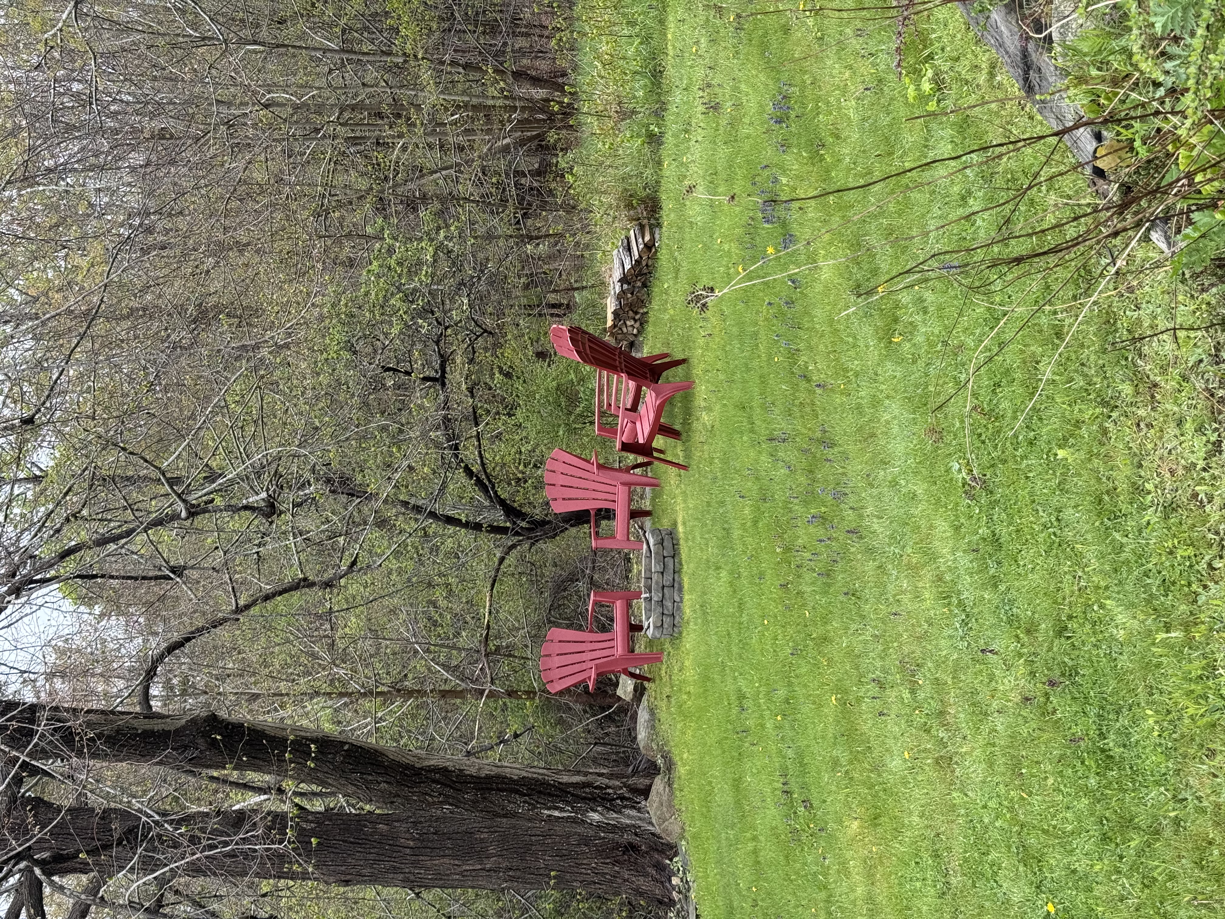 Fire pit with Adirondack chairs