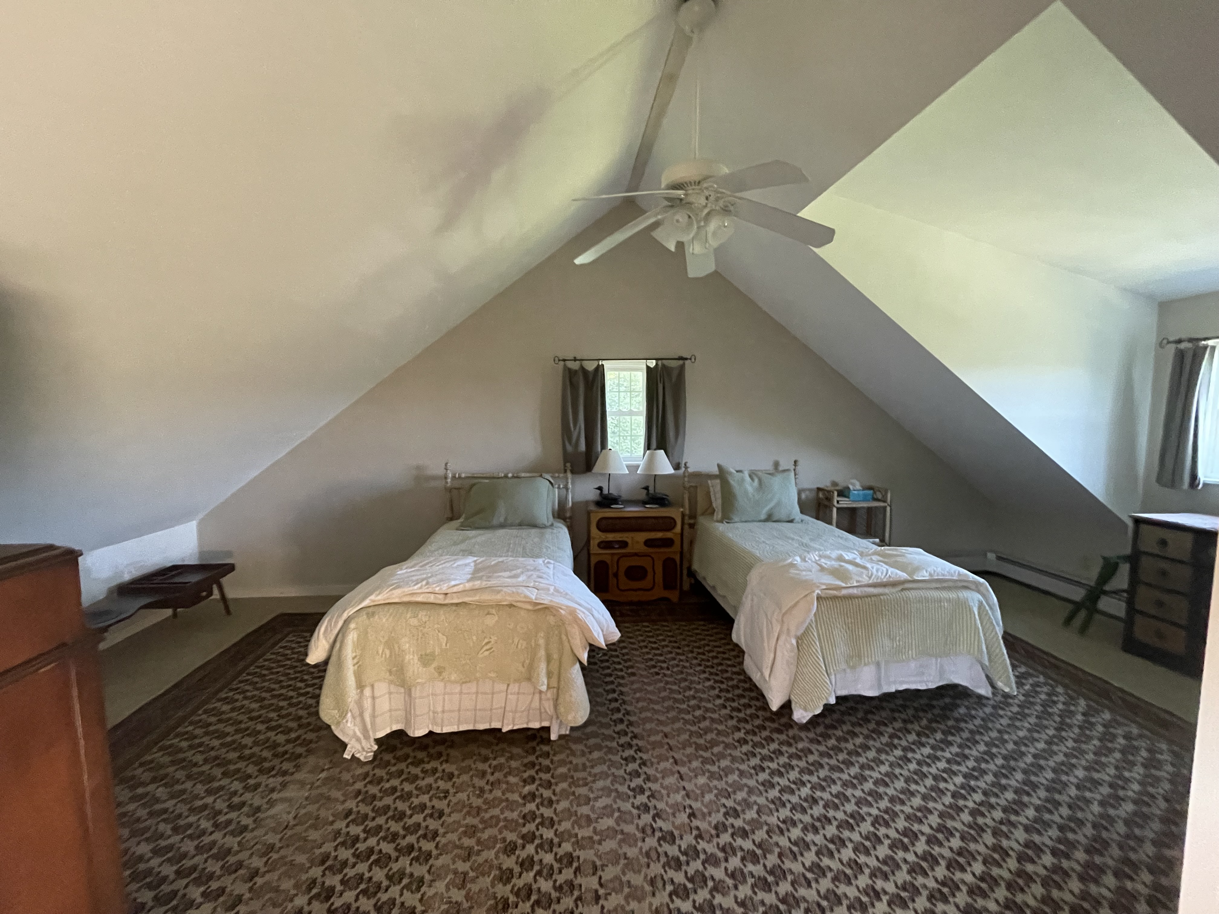 Attic bedroom with slanted ceiling