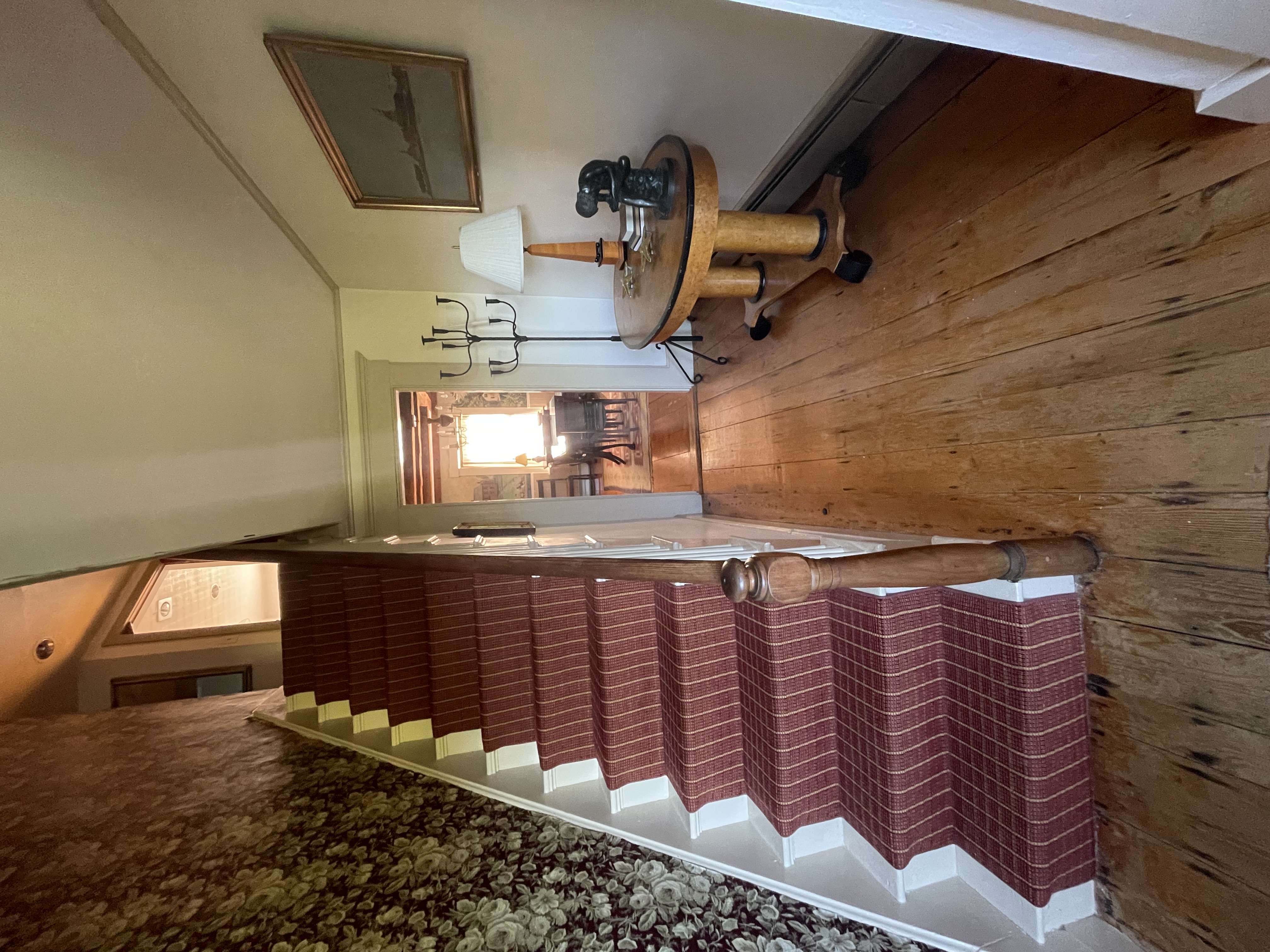 Entry staircase with original pine floors