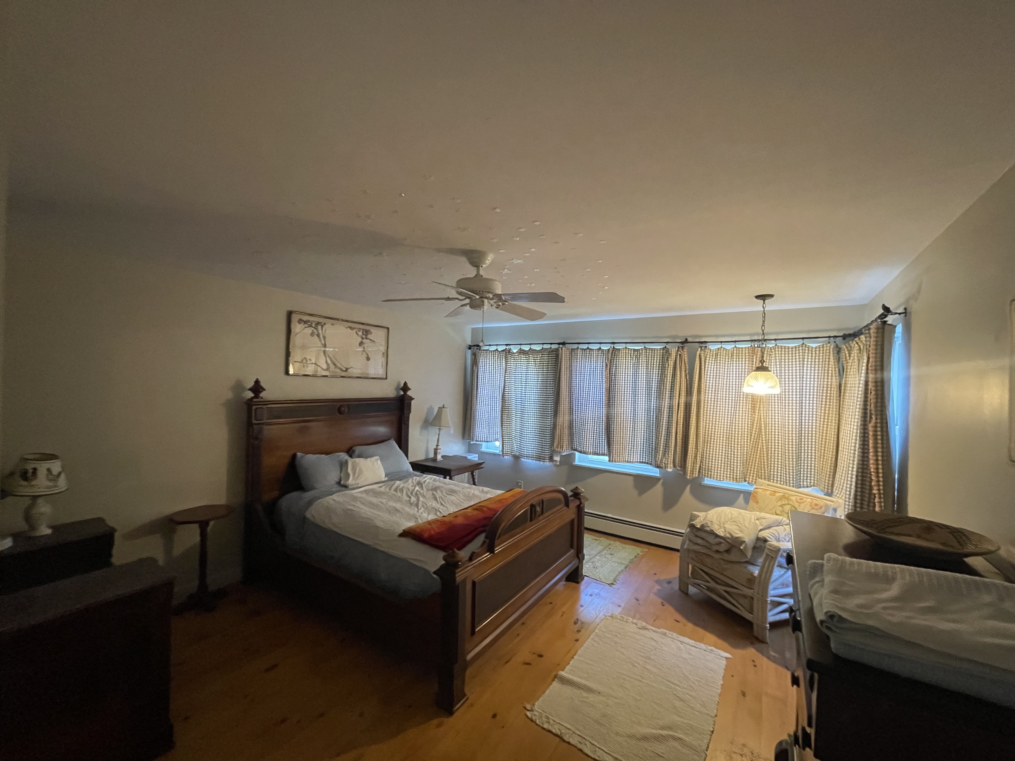 Master bedroom with antique bed frame