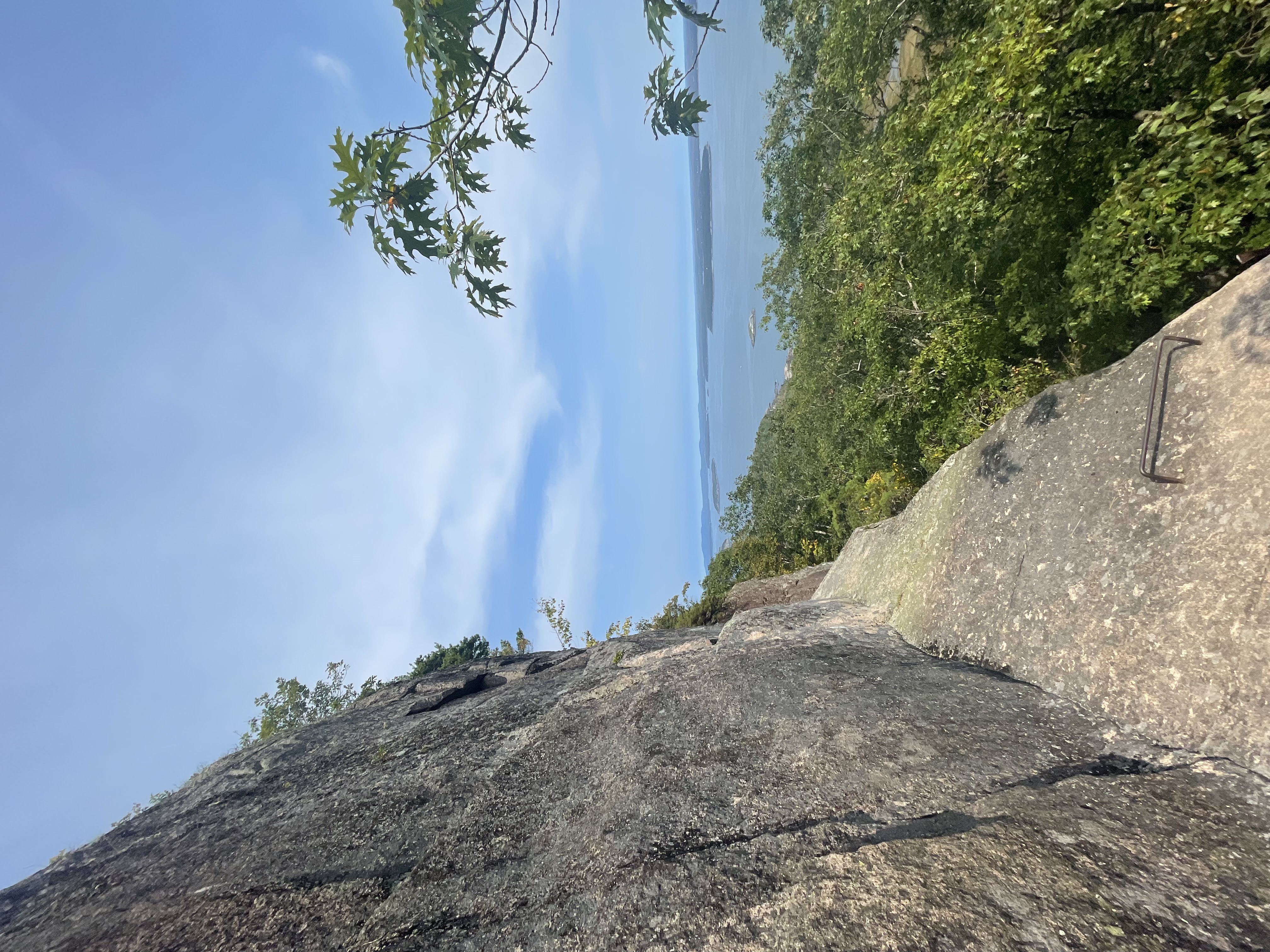 Cliff ladder trail with harbor view